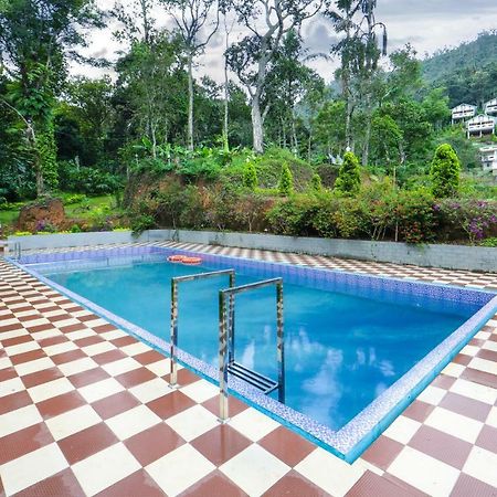 Hotel Blossom Hill Munnar à Devikolam Extérieur photo