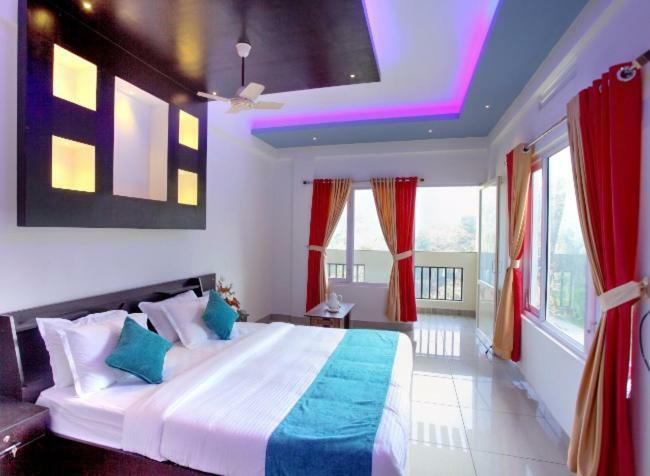 Hotel Blossom Hill Munnar à Devikolam Extérieur photo