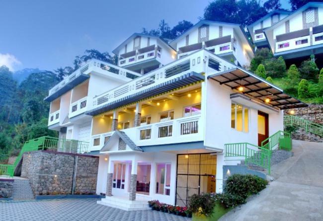 Hotel Blossom Hill Munnar à Devikolam Extérieur photo