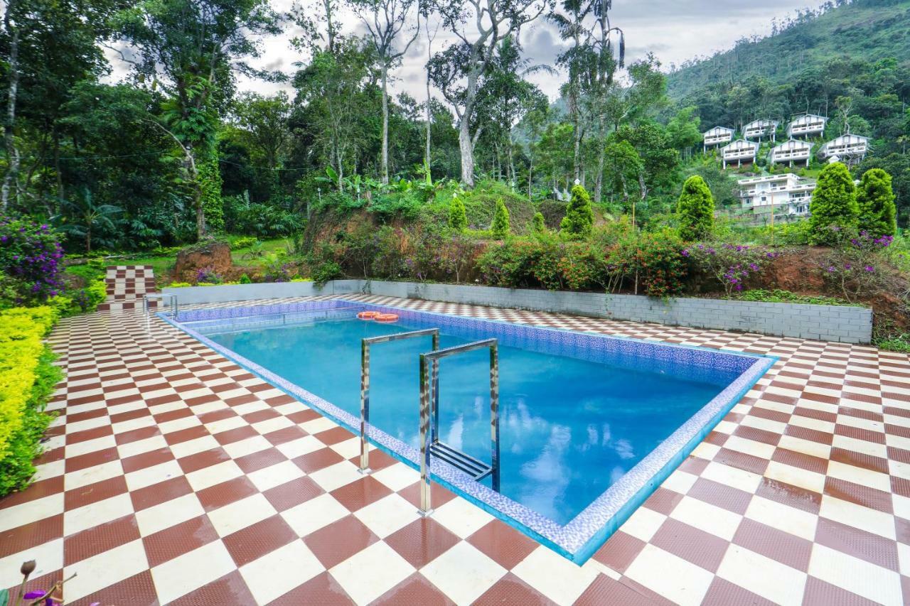 Hotel Blossom Hill Munnar à Devikolam Extérieur photo
